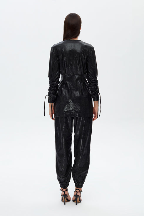 Medusa zipper detailed trousers