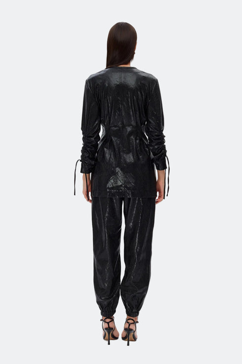 Medusa zipper detailed trousers