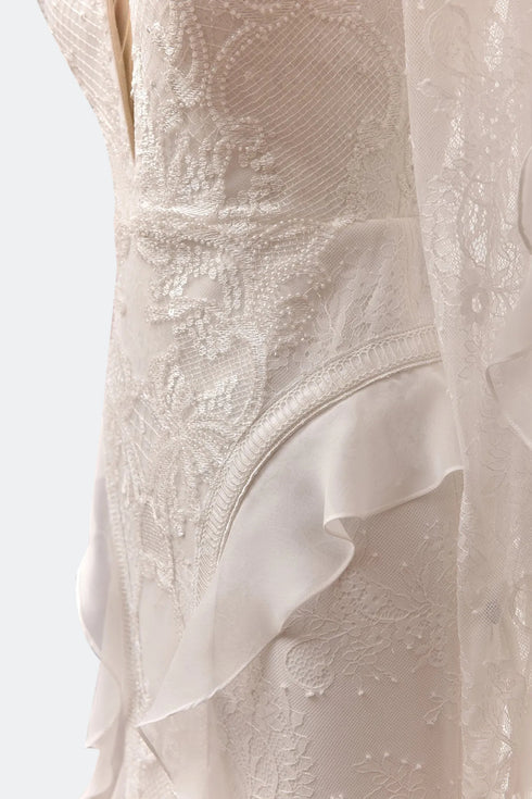 INLAID, FRENCH LACE WEDDING DRESS WITH FLOUNCE SLEEVE AND HIP DETAIL - Barrus London
